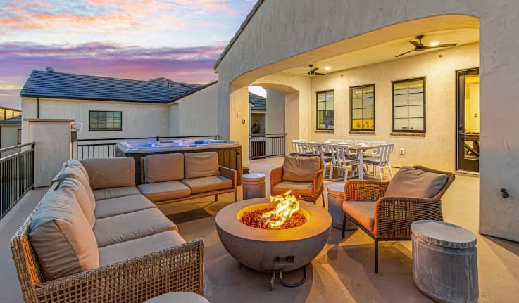 Rooftop patio with fire pit and hot tub