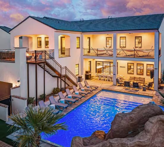 Private luxury retreat home with pool at sunset